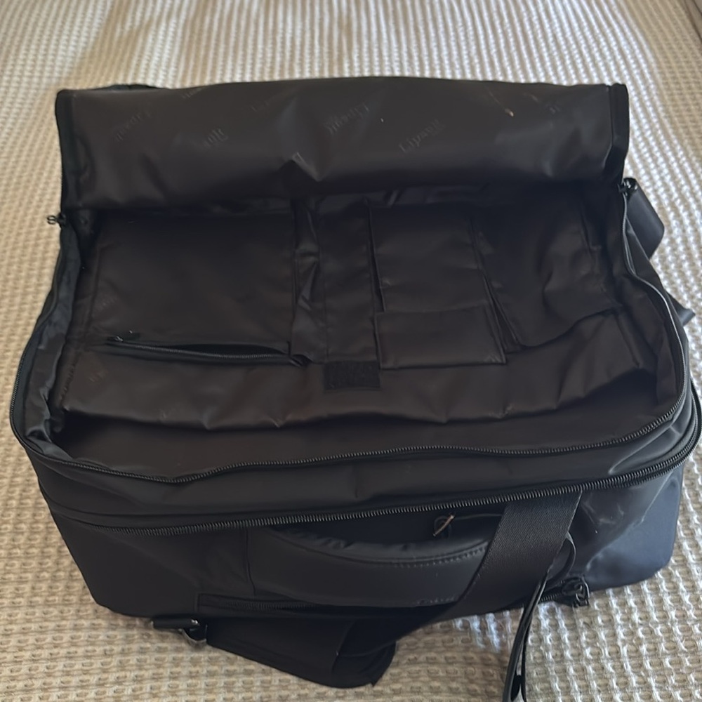 Lipault Black Durable Travel Bag with Multiple Compartments